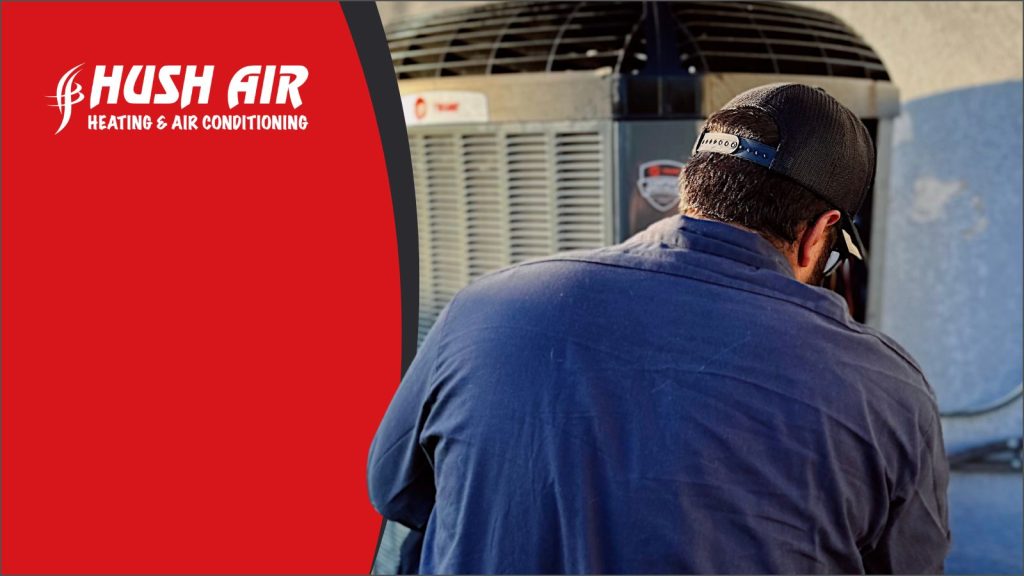A Hush HVAC tech servicing a AC unit.