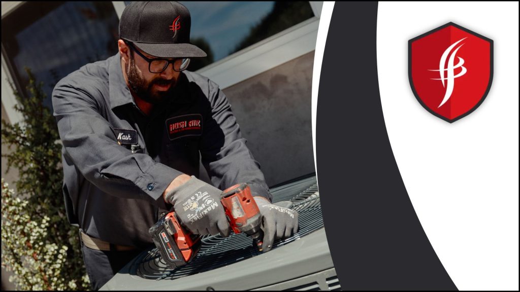 An HVAC technician making another repair