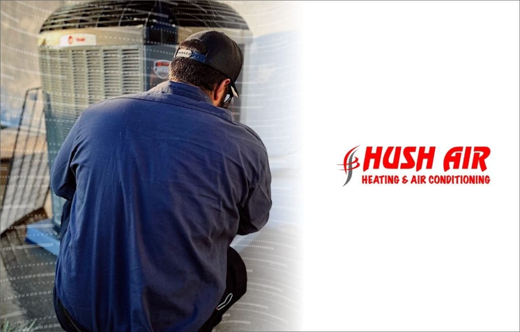 A hush HVAC technician working on an AC unit that's making odd noises.